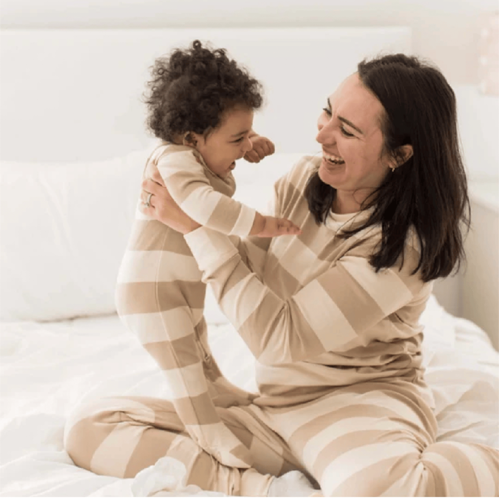 Mom and Newborn Wear Matching Rugby Stripe Pajamas