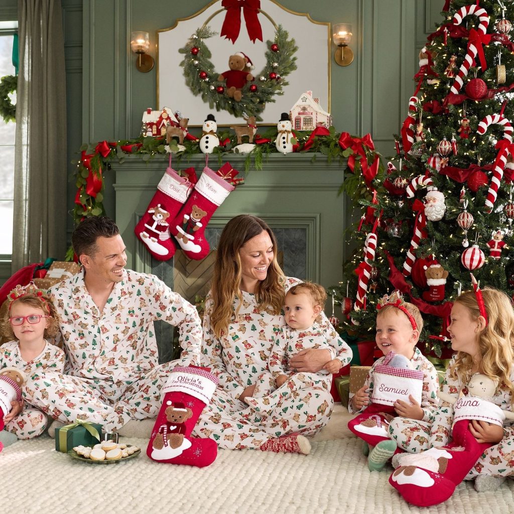 Family wearing matching teddy bear Christmas pajamas by Pottery Barn Kids